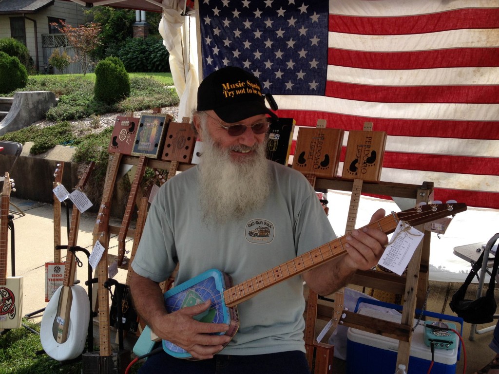 Rotten Roger with one of his Cigar Box Guitars.